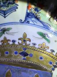 A Chinese famille verte "Provinces" dish with the arms of France, Kangxi/Yongzheng